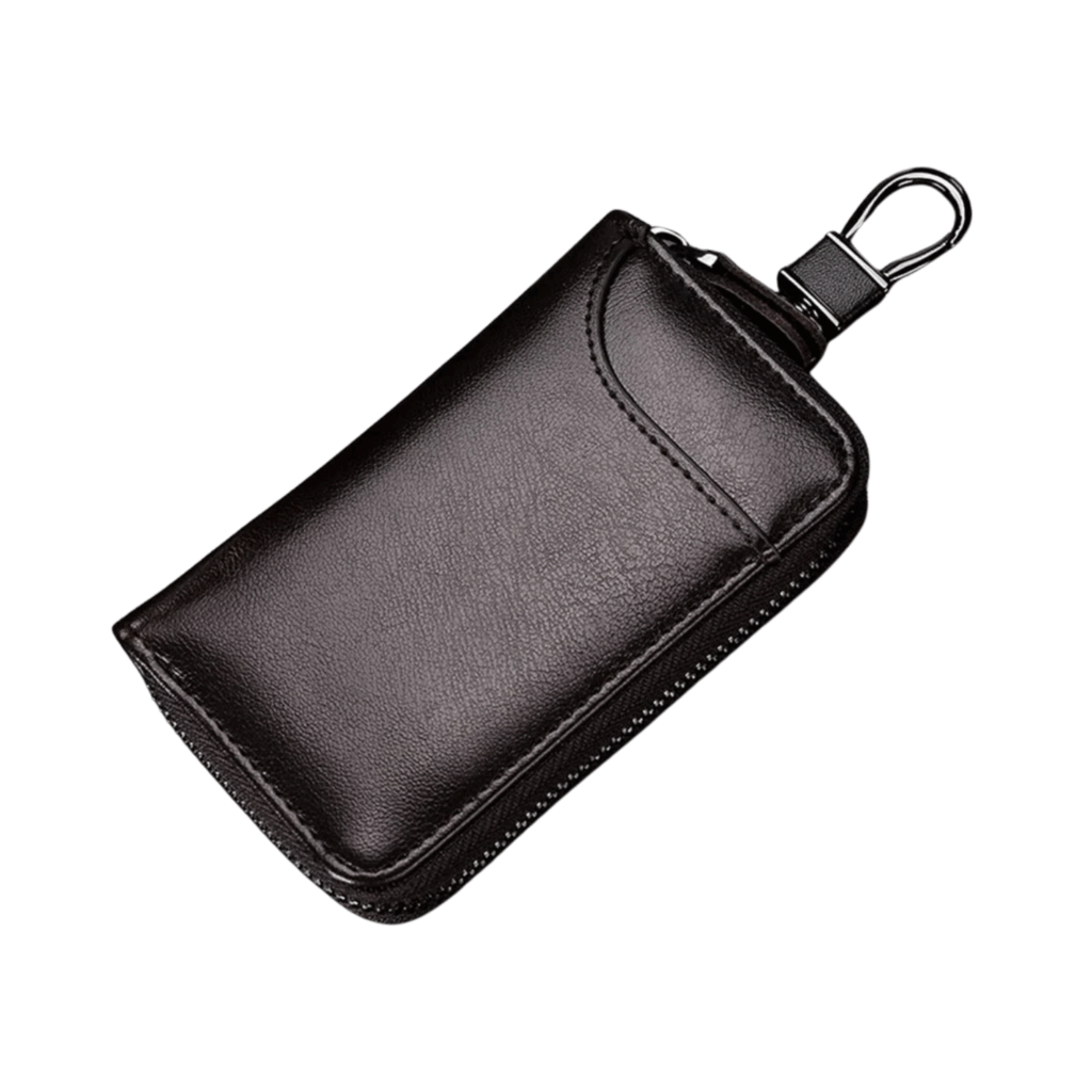 Ein schwarzes Schlüsseltui aus Leder mit Reißverschluss und einem Metallclip an der oberen Ecke, abgebildet vor einem weißen Hintergrund.